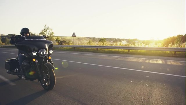 Anonymous man riding motorcycle