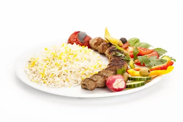 Zelfklevend Fotobehang Grilled Lamb Kebab Off The Skewer On White Plate © leowolfert