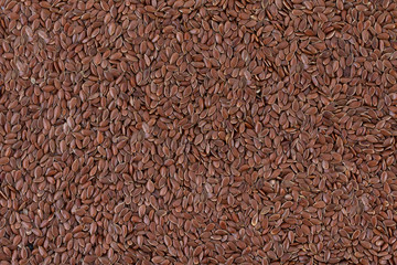 Flax seeds background, popular dietary product for a healthy diet