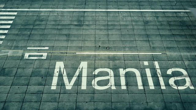 Aerial view of big airplane arriving to Manila airport. Travel to Philippines conceptual intro animation