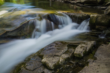 Fototapeta premium background landscape with waterfall in Yaremche vilage in Ukraine