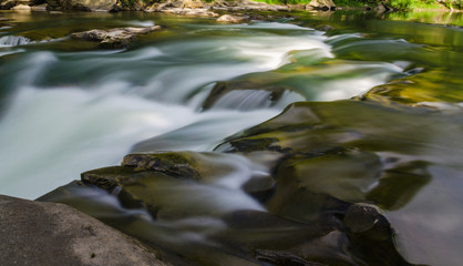 background landscape with waterfall in Yaremche vilage in Ukraine