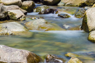 background landscape with waterfall in Yaremche vilage in Ukraine