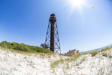Old lighthouse on the shore of the Black sea, Dzharylhach island, Ukraine