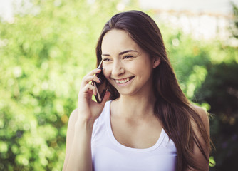 Girl talking on phone and smiling