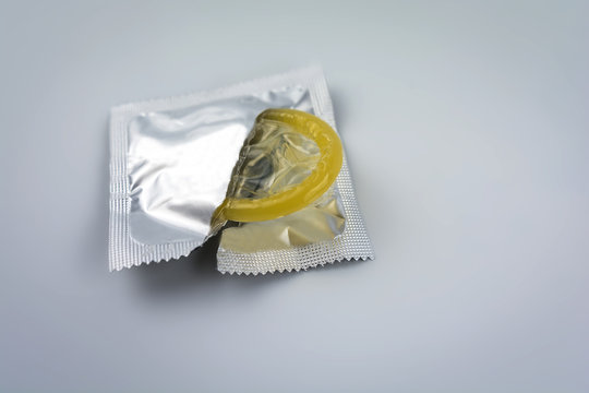 Condom close-up isolated. Contraceptive protection from pregnancy.