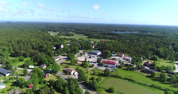 Korppoo, Cinema 4k aerial rising tilt view towards Korpo town, on a sunny summer day, in the finnish archipelago outside Turku, Varsinais-suomi, Finland