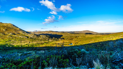 Fototapeta premium The Noordhoek and Kommetjie region in the Cape Town area viewed from the Ou Kaapse Weg, Old Cape Road, on a clear winter morning