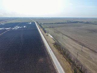 Top view of the field. Early spring in the Kuban. Agricultural g