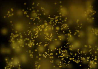 Abstract yellow and dark bokeh.