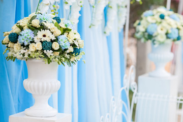 flower in wedding ceremony,blue flower on greek vase