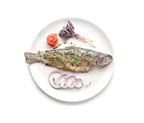 Plate with tasty fried fish on white background
