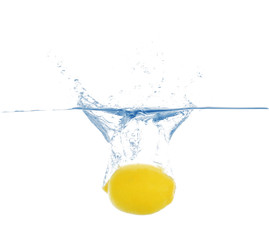 Lemon in water on white background