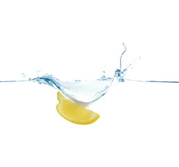 Falling lemon slice into water on white background