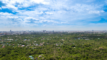 Aerial View of Bangkok skyline and view of Chao Phraya River View from green zone in Bang Krachao,...