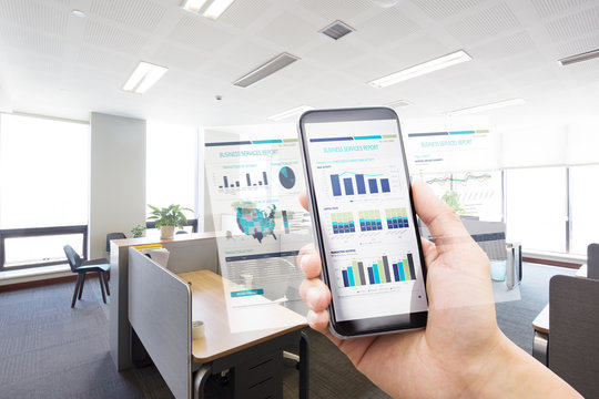 smart phone with business report in modern office