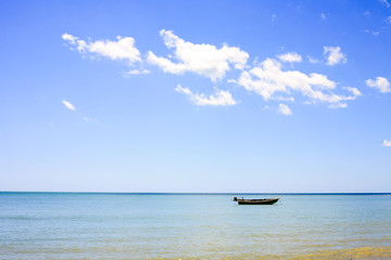 Boat resting on calm sea