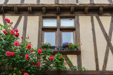 Fototapeta na wymiar Exterior decoration of the window of the old house in Cognac , france