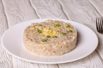 Pearl barley risotto with cheese and green onion