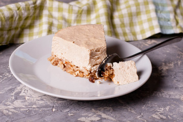 Caramel cheesecake on a white plate