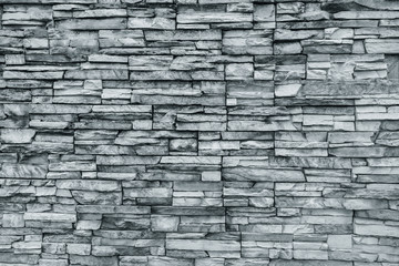 Gray stone wall.
