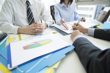 Men are signing a contract