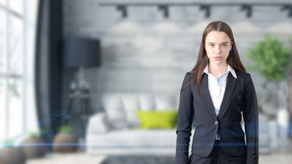 Young beautiful business woman and creative designer standing over blured interior background