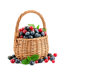 Fresh berries in basket isolated on white background