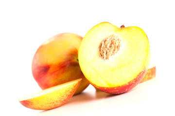 Peaches on a white background