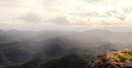View of the mountains that glow under sunlight. Dramatic morning scene.