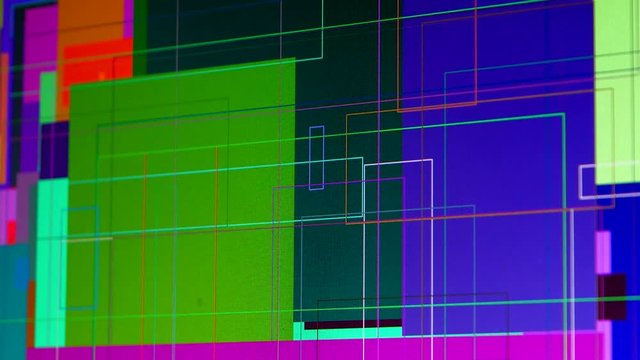 Multicolored graphics of stripes and triangles on a computer monitor