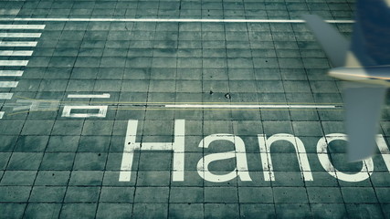 Fototapeta na wymiar Aerial view of an airplane arriving to Hanoi airport. Travel to Vietnam 3D rendering