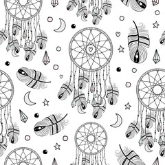 Hand drawn seamless pattern. Indian dream catchers, feathers. White background