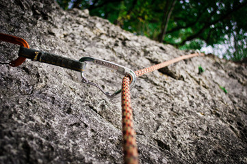 Carabiner and Climbing Rope in Mountain