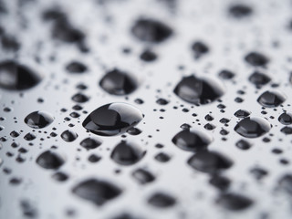 Drops on a dark glass background