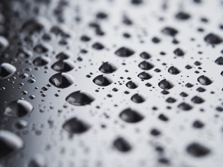 Drops on a dark glass background