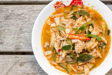 Thai food red curry pig with bamboo shoots.