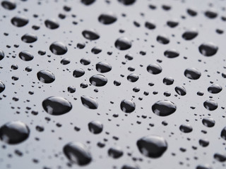 Drops on a dark glass background