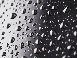 Drops on a dark glass background