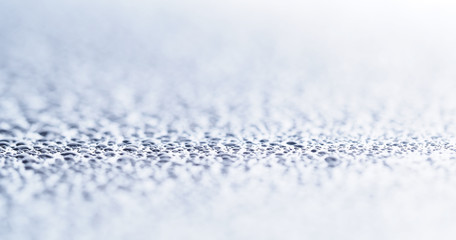 Drops on a dark glass background