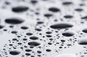 Drops on a dark glass background