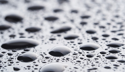 Drops on a dark glass background