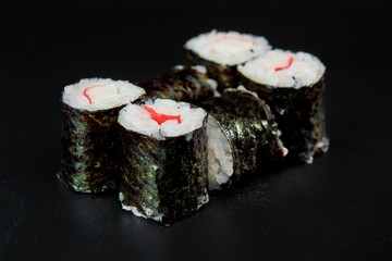Sushi on black background. Perfect for creating sushi restaurant menu. Part of series.