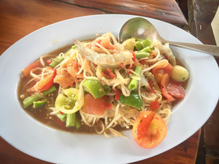 Papaya salad a Thai dish spicy seafood with mix vegetable.