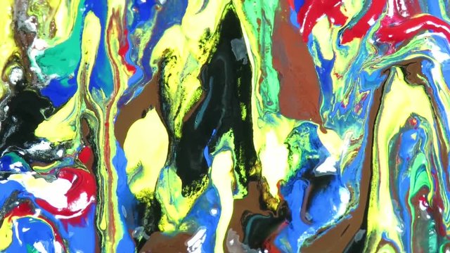 Abstract pattern of different acrylic colors , blending together and sliding on a vertical surface into a mesmerizing mixture , art therapy and catharsis