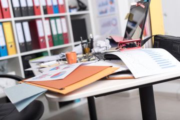 Messy and cluttered desk