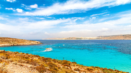 Coast of the Comino island between the islands of Malta and Gozo in the Mediterranean Sea, Europe.