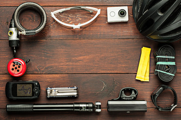 old used cycling accessories on wooden table