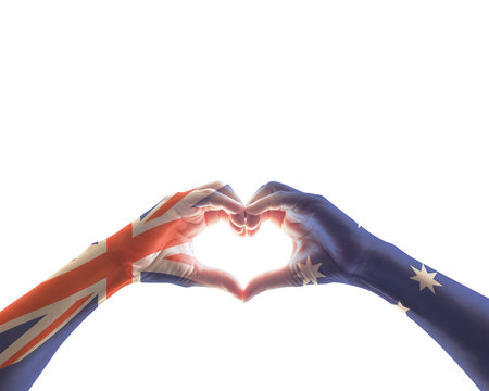 Australia national flag  on people hands in heart shape isolated on white background for labour day and national holiday celebration