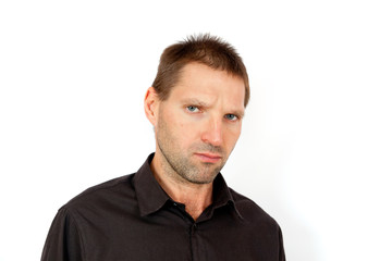 Obraz premium The young man frowned, looking appreciatively